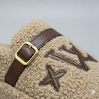 Chaussons en polaire Teddy : doigts de pied au chaud, boucle qui tient bien en place.