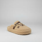 Chaussons en polaire Teddy : doigts de pied au chaud, boucle qui tient bien en place.
